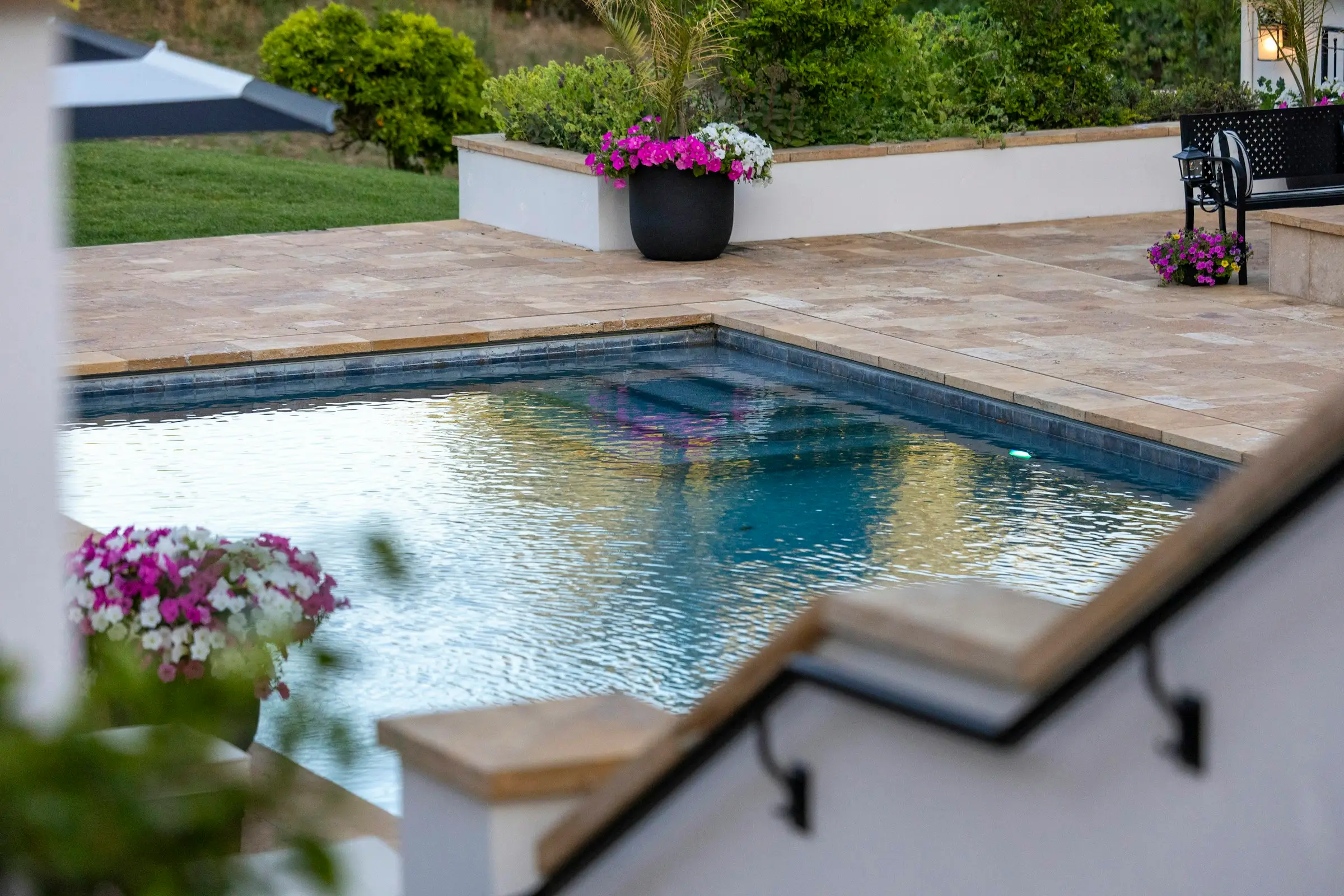 Pool set into terraced garden