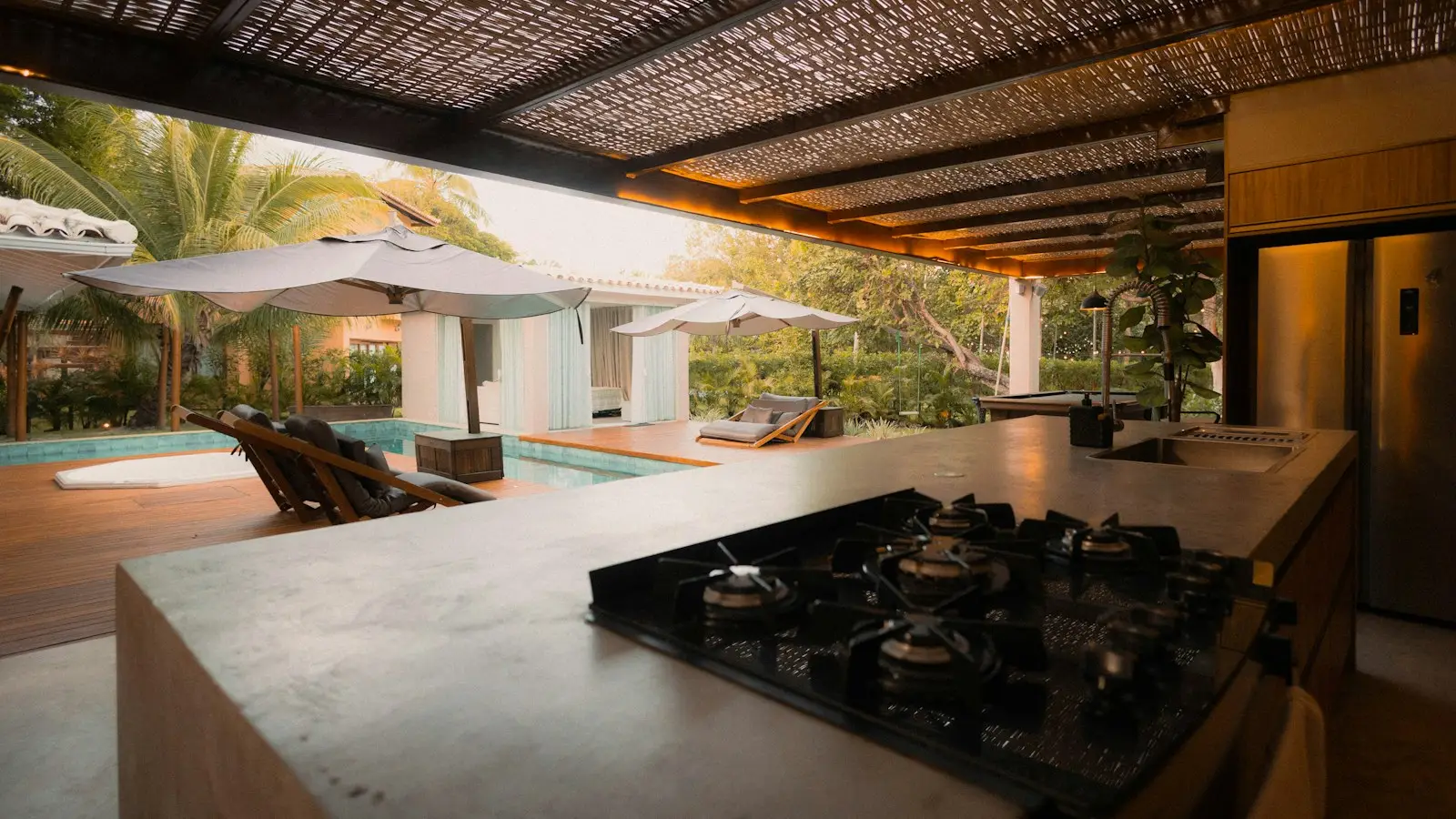 Covered outdoor kitchen and dining area
