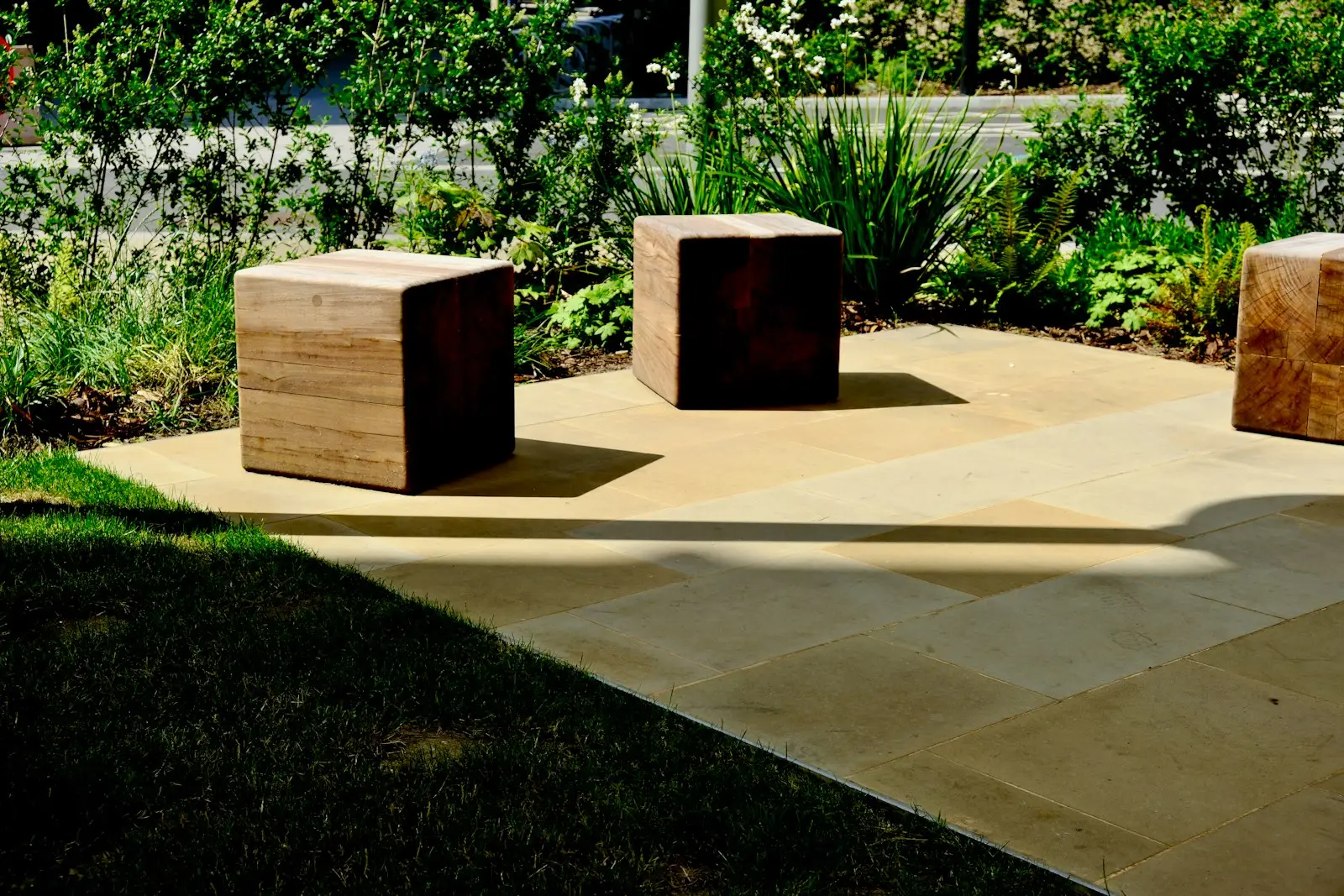 Stone retaining walls and terraced lawn